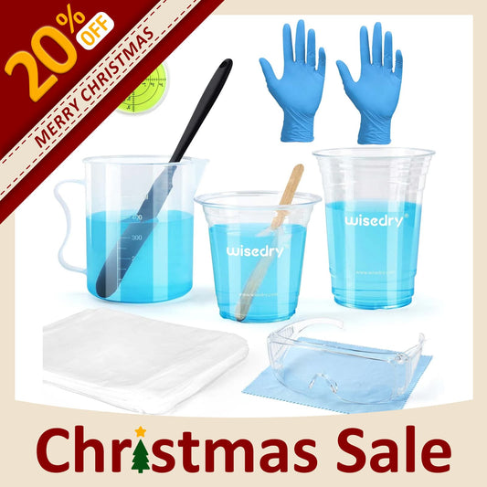 Epoxy resin crafting kit with large measuring cups, stir sticks, gloves, goggles, waterproof tablecloths, and mini level.